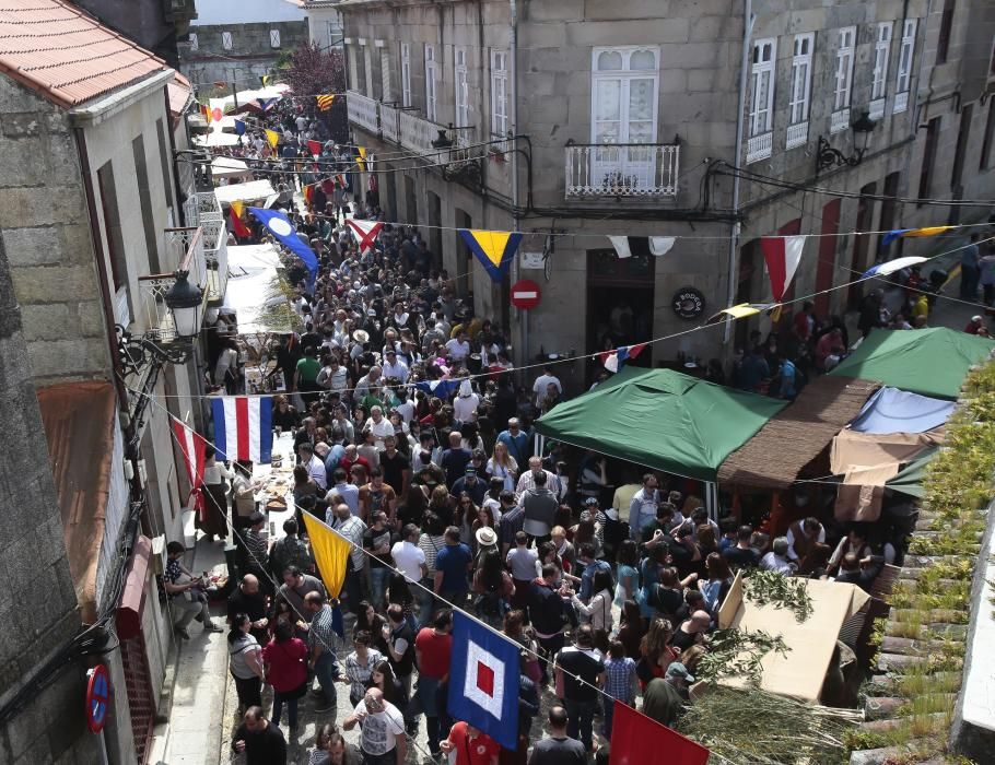 El barrio vigués celebra entre gastronomía, artesanía, música y baile la expulsión de las tropas francesas en 1809