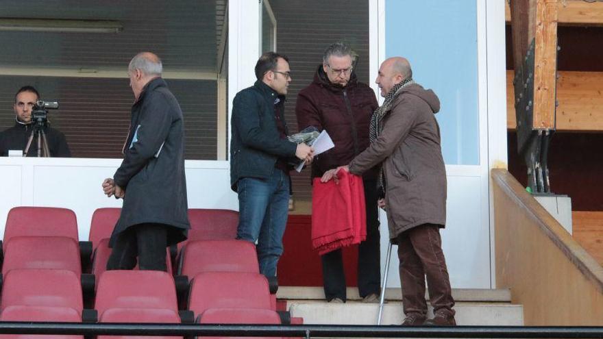 El presidente rojiblanco, junto a dos directivos.