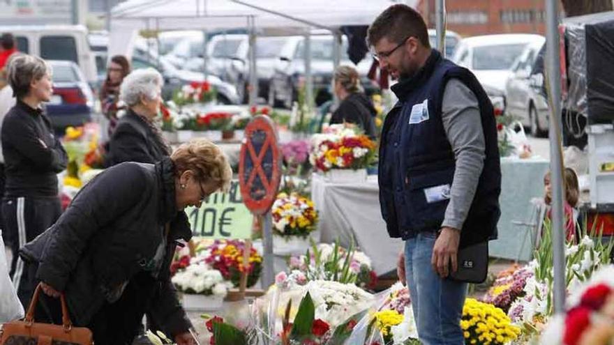 Venta de flores en el cementerio.