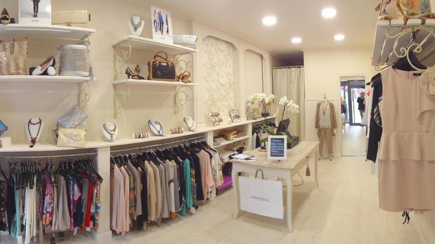 Interior de la tienda de moda Manuela Boutique.