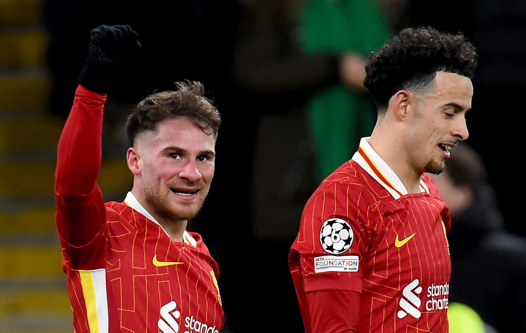 Liverpool (United Kingdom), 27/11/2024.- Alexis Mac Allister (L) of Liverpool celebrates with teammate Curtis Jones after scoring the opening goal during the UEFA Champions League match between Liverpool and Real Madrid in Liverpool, Britain, 27 November 2024. (Liga de Campeones, Reino Unido) EFE/EPA/PETER POWELL