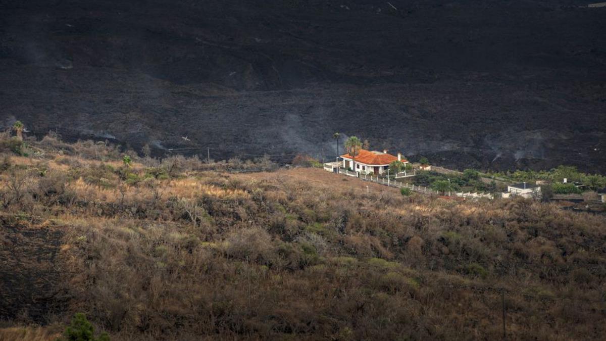 Una vivienda con un terreno, a pocos metros de una de las coladas. | | ARTURO RODRÍGUEZ