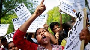 A woman reacts at a protest against the rape of an eight-year-old girl, in Kathua, near Jammu and a teenager in Unnao, Uttar Pradesh state, in New Delhi, India April 12, 2018. REUTERS/Cathal McNaughton