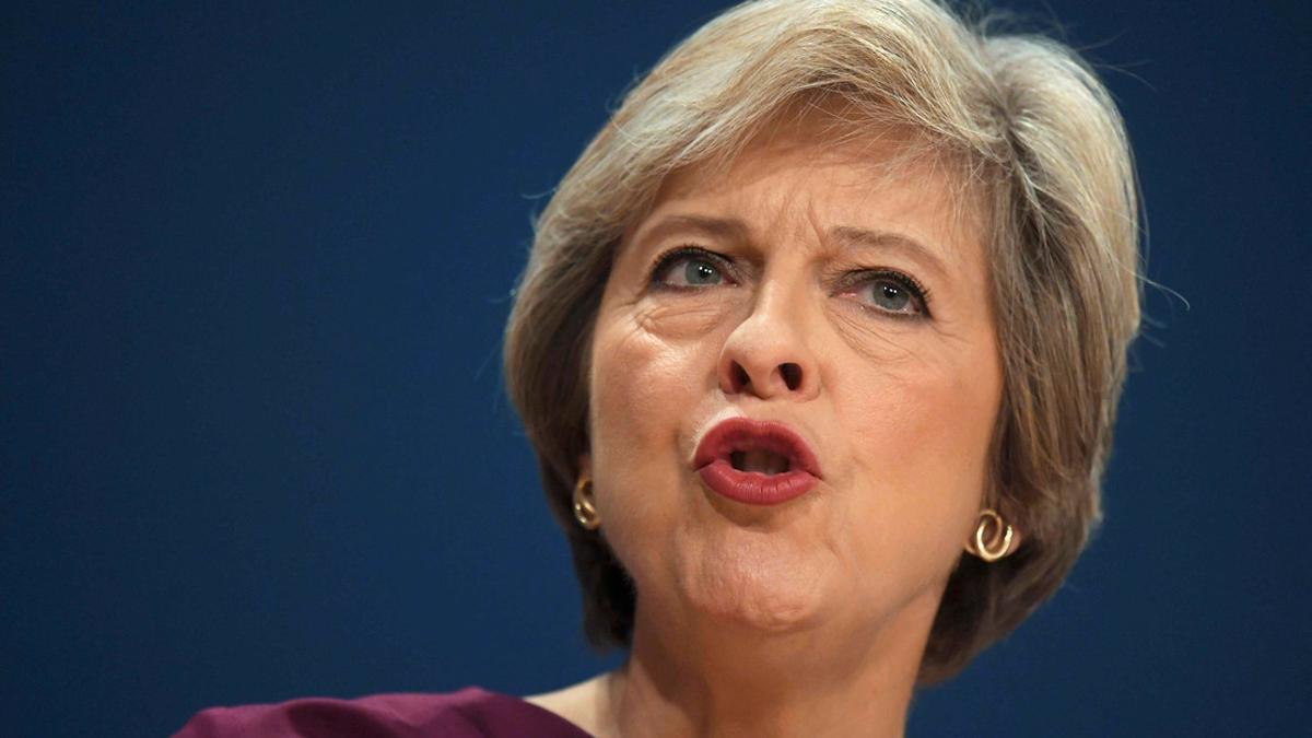 Britain's Prime Minister Theresa May gives her speech on the final day of the annual Conservative Party Conference in Birmingham