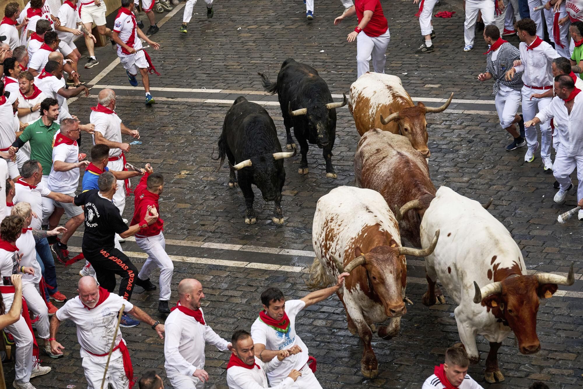 El primer encierro de los Sanfermines 2025, en imágenes.