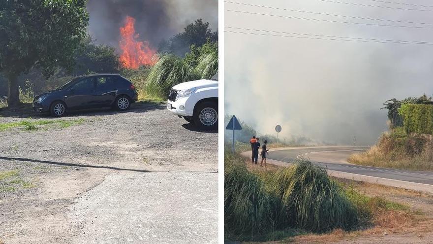 Imágenes del incendio que se registra en Catoira y obligó a cerrar la carretera.