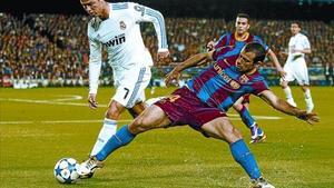 Mascherano i Cristiano Ronaldo en el clàssic de la Champions jugat al Camp Nou a l’abril.