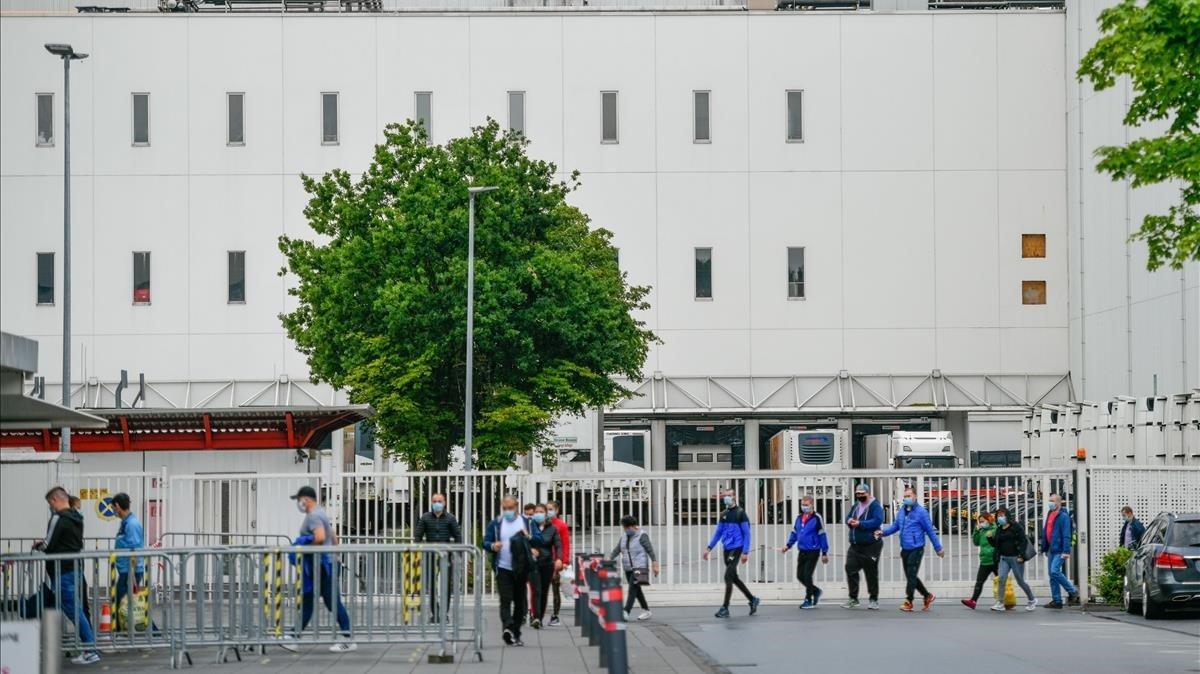 zentauroepp53787320 employees walk outside the headquarters of abattoir company 200617195342