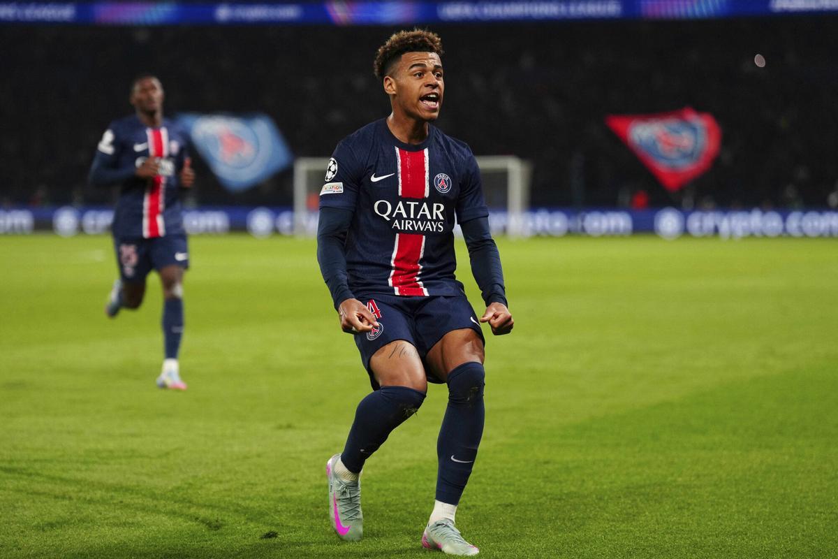 PSG's Desire Doue celebrates after scoring his side's first goal during the Champions League quarterfinal first leg soccer match between Paris Saint-Germain and Aston Villa at Parc des Princes stadium in Paris, Wednesday, April 9, 2025. (AP Photo/Aurelien Morissard)