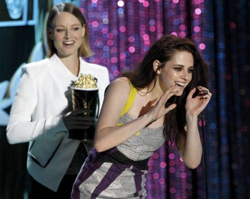 Actress Kristen Stewart accepts the award for movie of the year for "The Twilight Saga: Breaking Dawn Part 1" at the 2012 MTV Movie Awards in Los Angeles