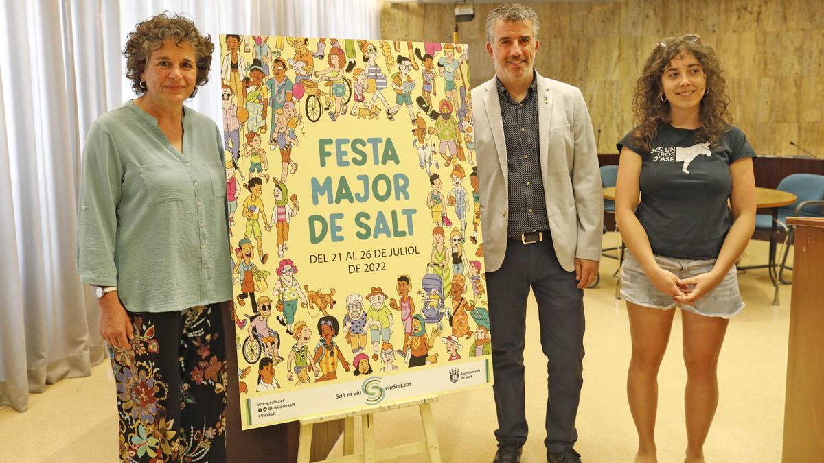 Núria Heras, Jordi VIñas i Marina Montenegro, amb el cartell.