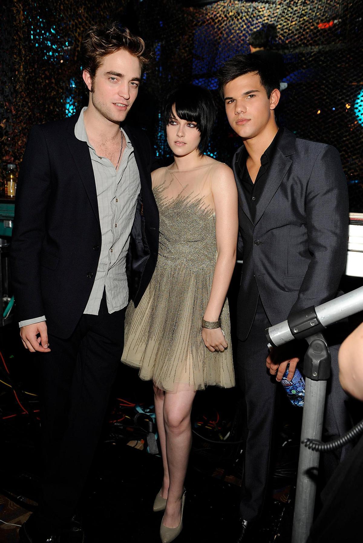 Los Crepúsculos Robert Pattinson, Kristen Stewart y Taylor Lautner.