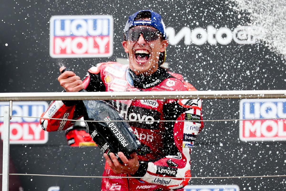 Hohenstein-Ernstthal (Germany), 12/07/2026.- Ducati Lenovo Team rider Marc Marquez of Spain celebrates on the podium after winning the MotoGP race of the motorcycling Grand Prix of Germany at the Sachsenring racing circuit in Hohenstein-Ernstthal, Germany, 12 July 2026. (Motociclismo, Alemania, España) EFE/EPA/FILIP SINGER