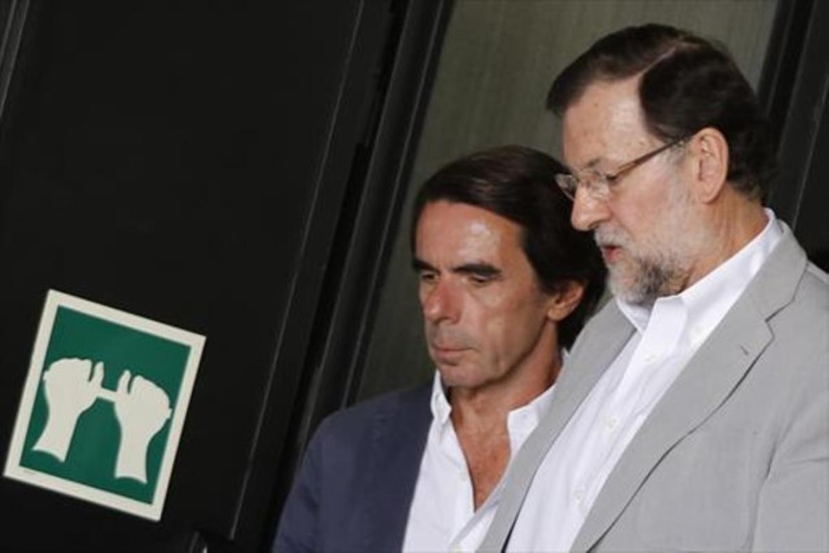 José María Aznar y Mariano Rajoy, ayer por la mañana, en el campus de FAES.