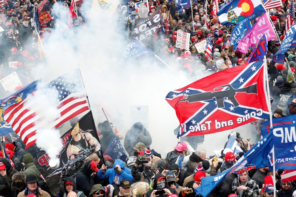 Tear gas is released into a crowd of protesters during clashes with Capitol police at a rally to contest the certification of the 2020 U.S. presidential election results by the U.S. Congress, at the U.S. Capitol Building in Washington, U.S, January 6, 2021. REUTERS/Shannon Stapleton