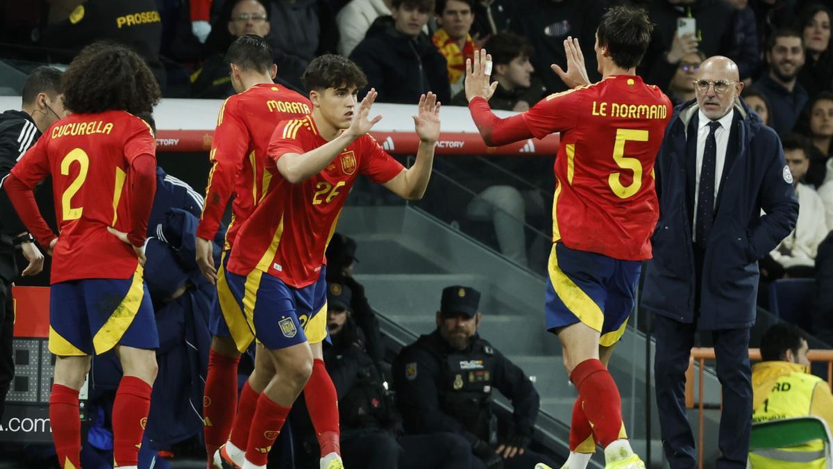 Cubarsi y Le Normand, en un partido con España