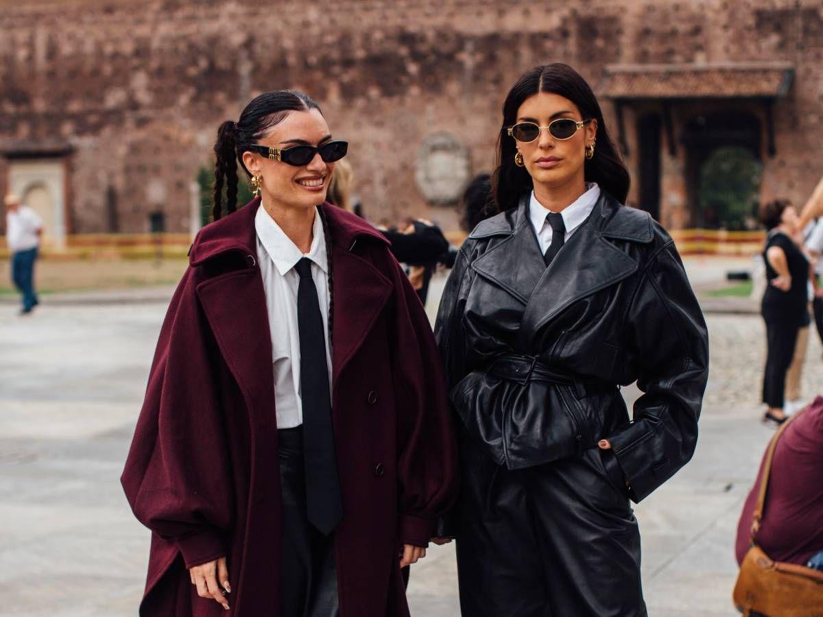 Madame y Dulceida con look con corbata, en la Semana de la Moda de Milán 2024