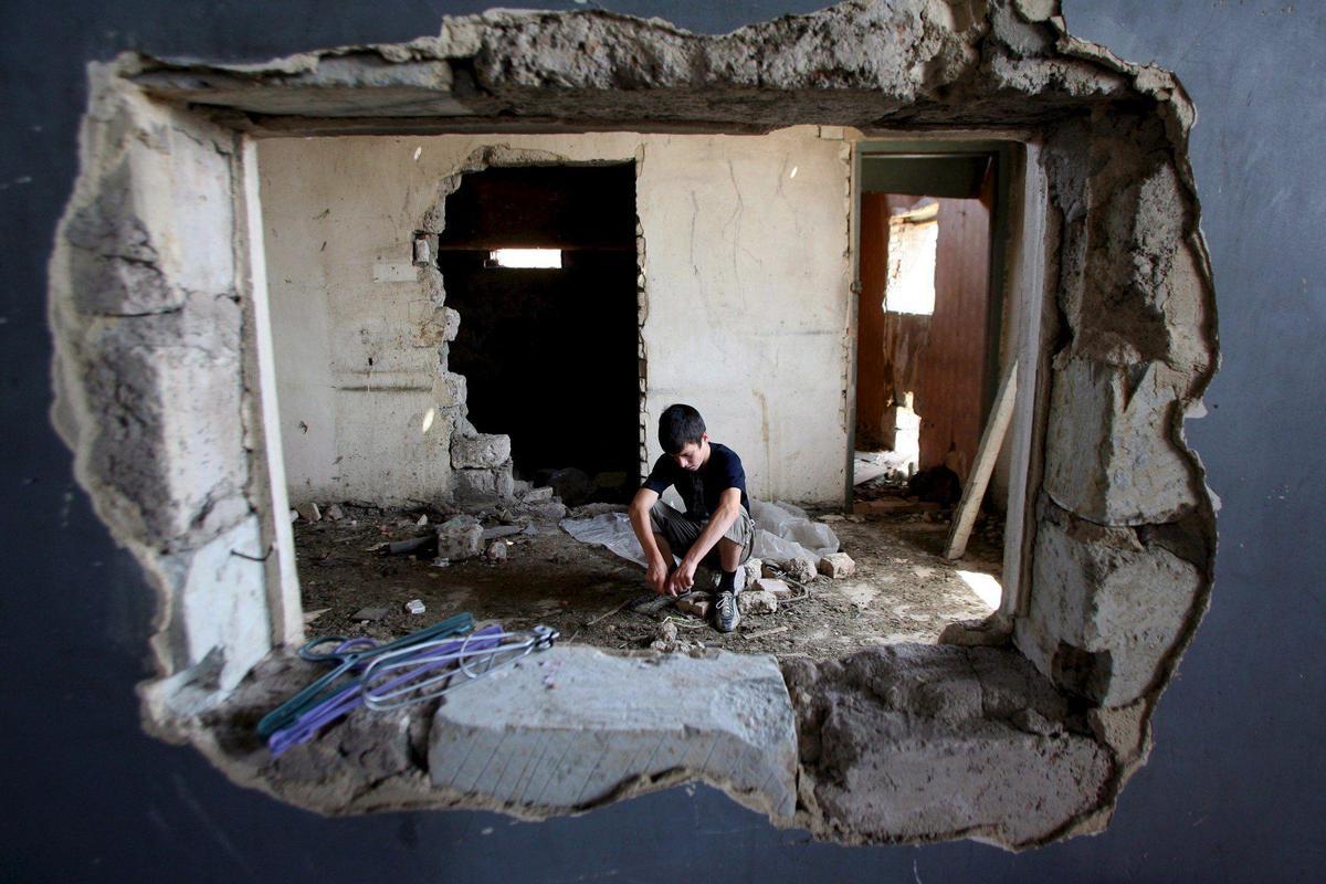 Imagen de una vivienda en Tibilisi (Georgia) tras los bombardeos rusos de 2008