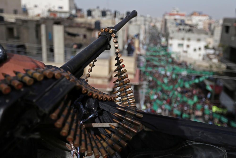 Weapon of a Palestinian security man is seen as ...