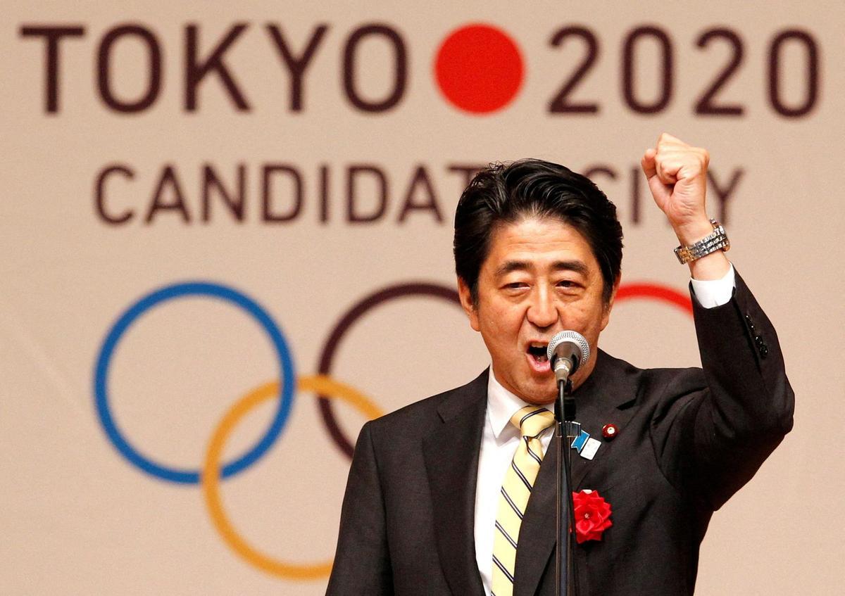 FILE PHOTO: Japans Prime Minister Shinzo Abe gestures as he speaks during Tokyo 2020 kick off rally in Tokyo