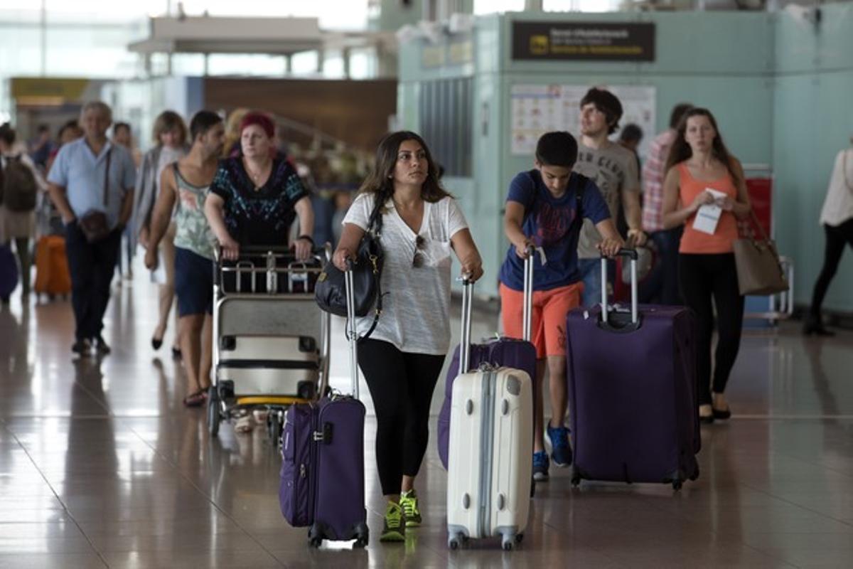 Viajeros en el aeropuerto de El Prat