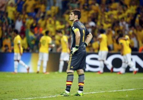 Spain's goalkeeper Iker Casillas reacts after Brazil scored their third goal during their Confederations Cup final soccer match at the Estadio Maracana in Rio de Janeiro