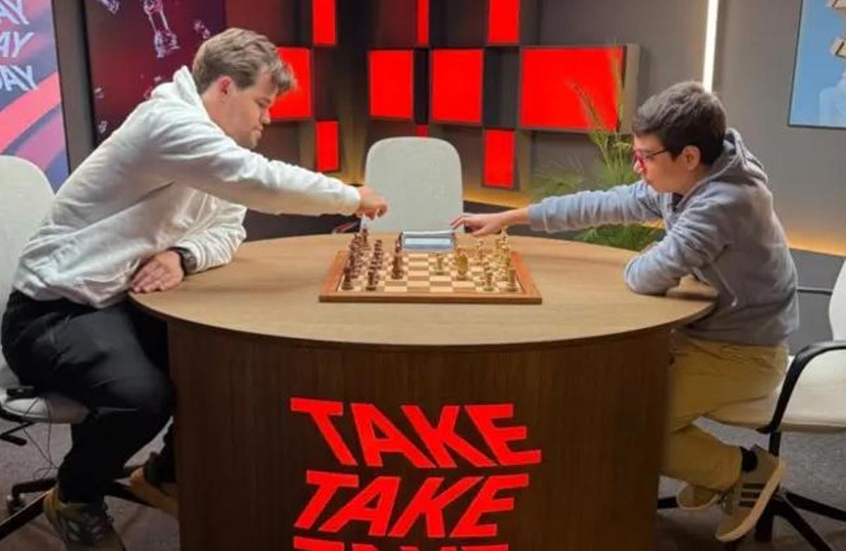 Magnus Carlsen, con Faustino Oro en Oslo