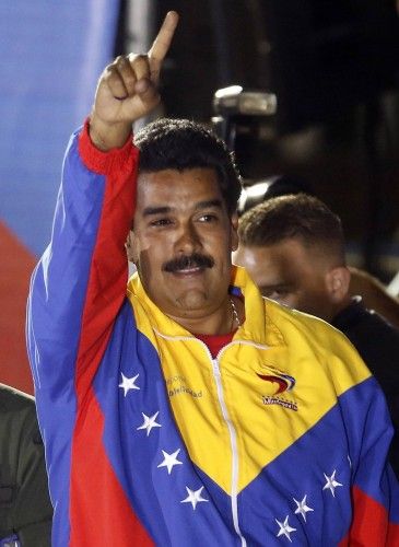 Venezuelan presidential candidate Maduro celebrates after official results gave him a victory in Caracas