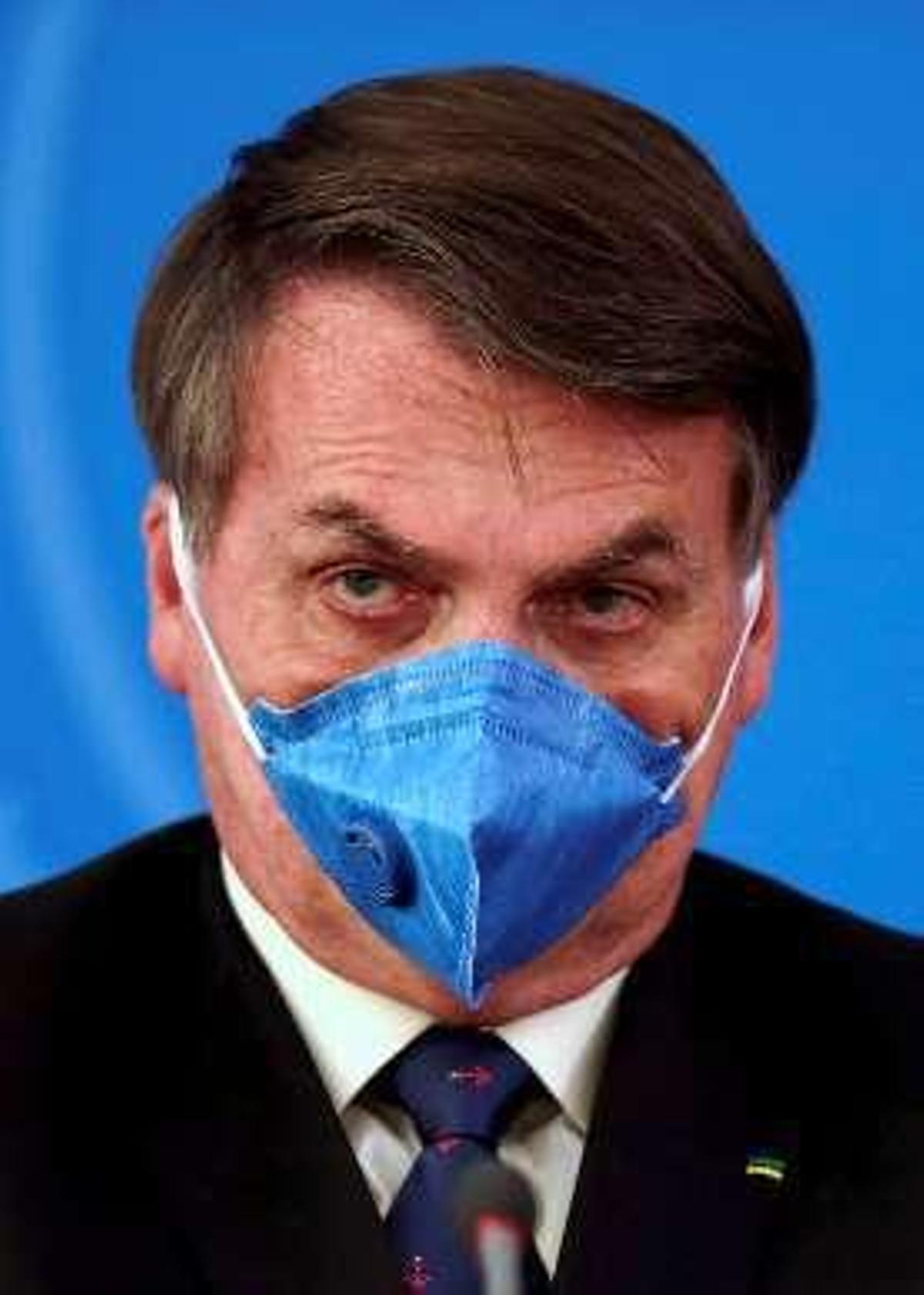 Bolsonaro, con mascarilla. // Reuters