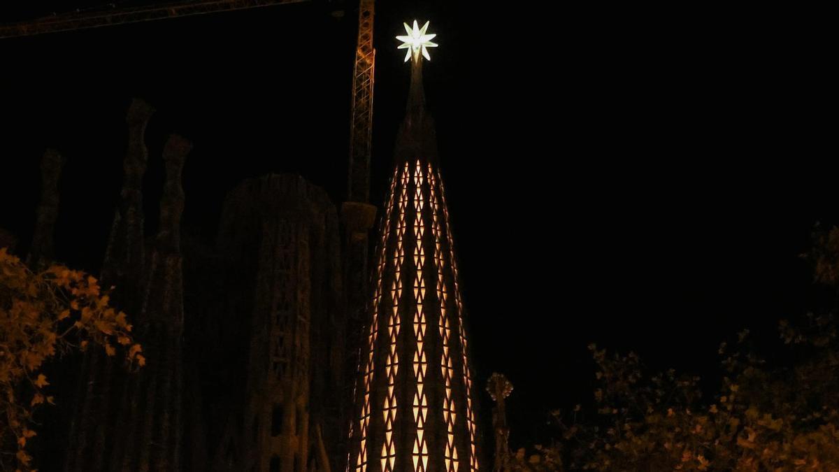 Star is lit on Sagrada Familia tower on Immaculate Conception Day, in Barcelona