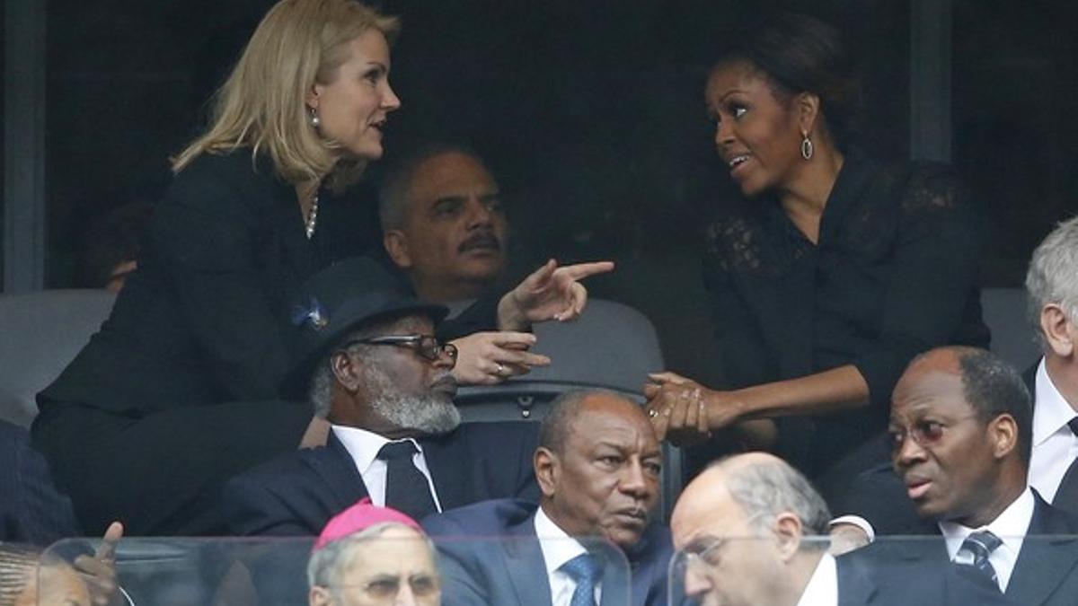 La primera ministra danesa, Helle Thorning-Schmidt, con Michelle Obama, en el palco.