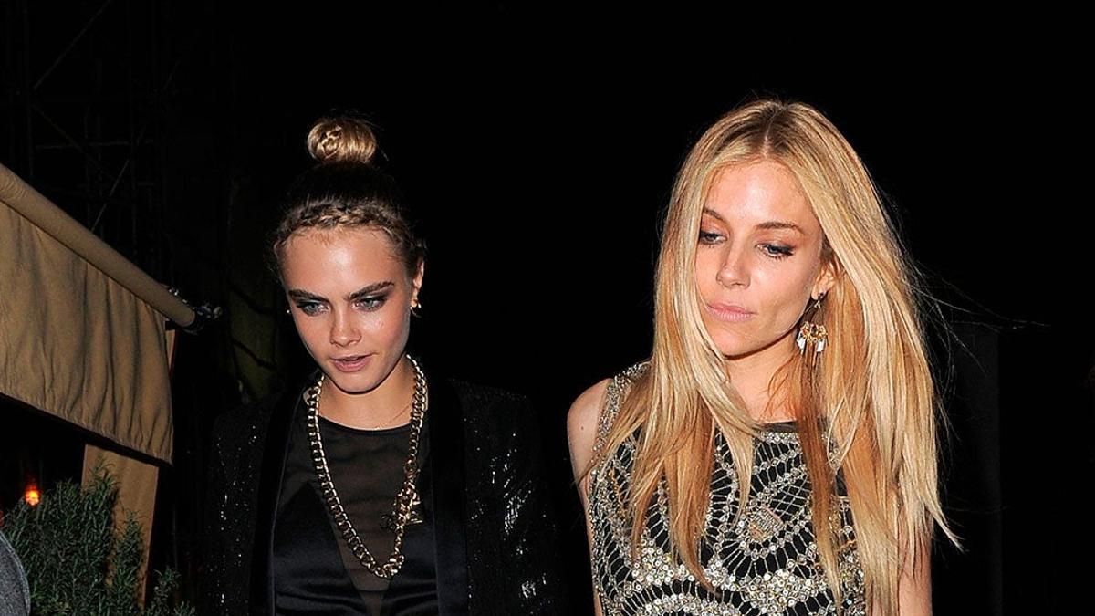 Cara Delevingne y Sienna Miler en 2014