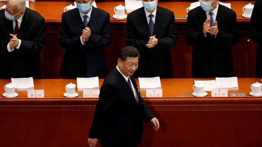 El presidente chino Xi Jinping, a su entrada en la Asamblea Nacional Popular. // Reuters