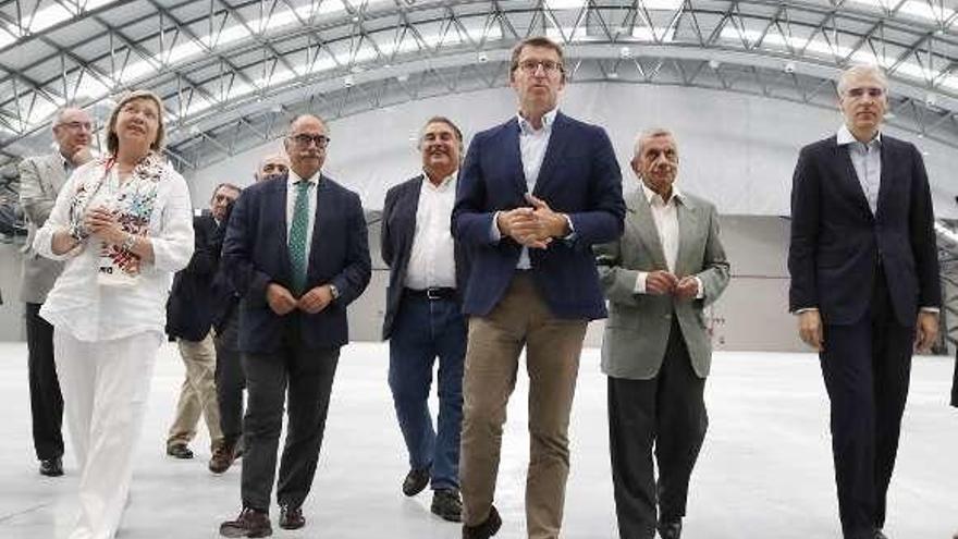 Quintana, Núñez Feijóo y Conde en la visita a las instalaciones.