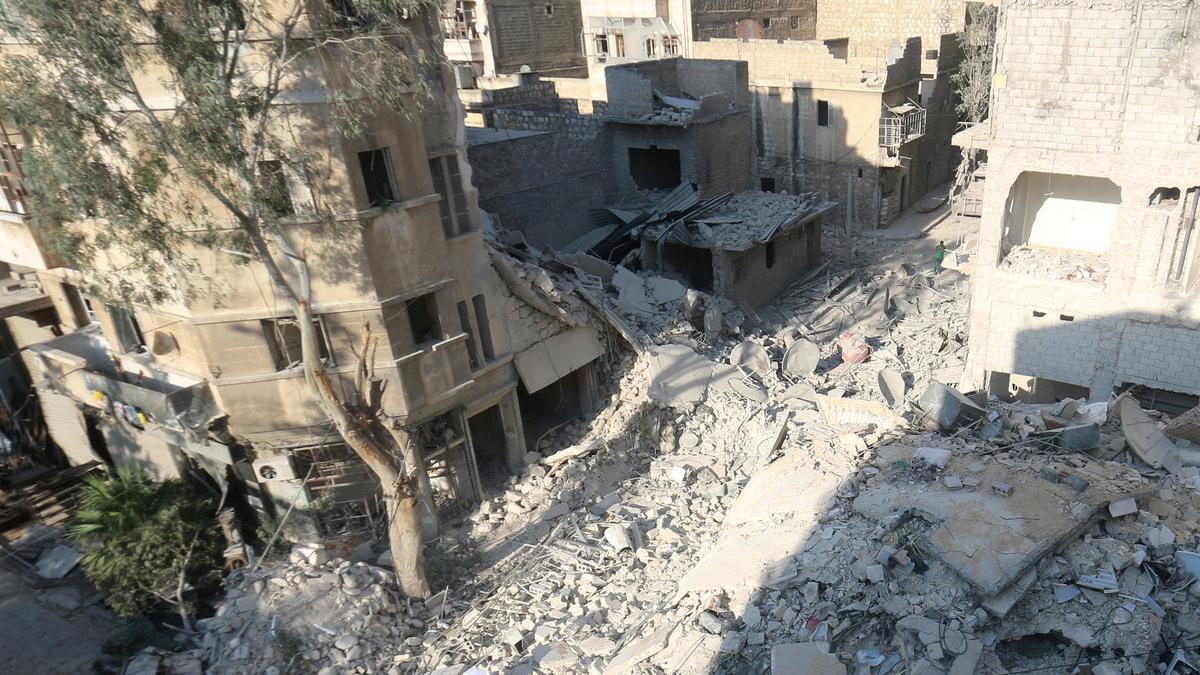 A general view shows the site of yesterday's airstrike where five-year-old Omran Daqneesh got injured in the rebel-held al-Qaterji neighbourhood of Aleppo