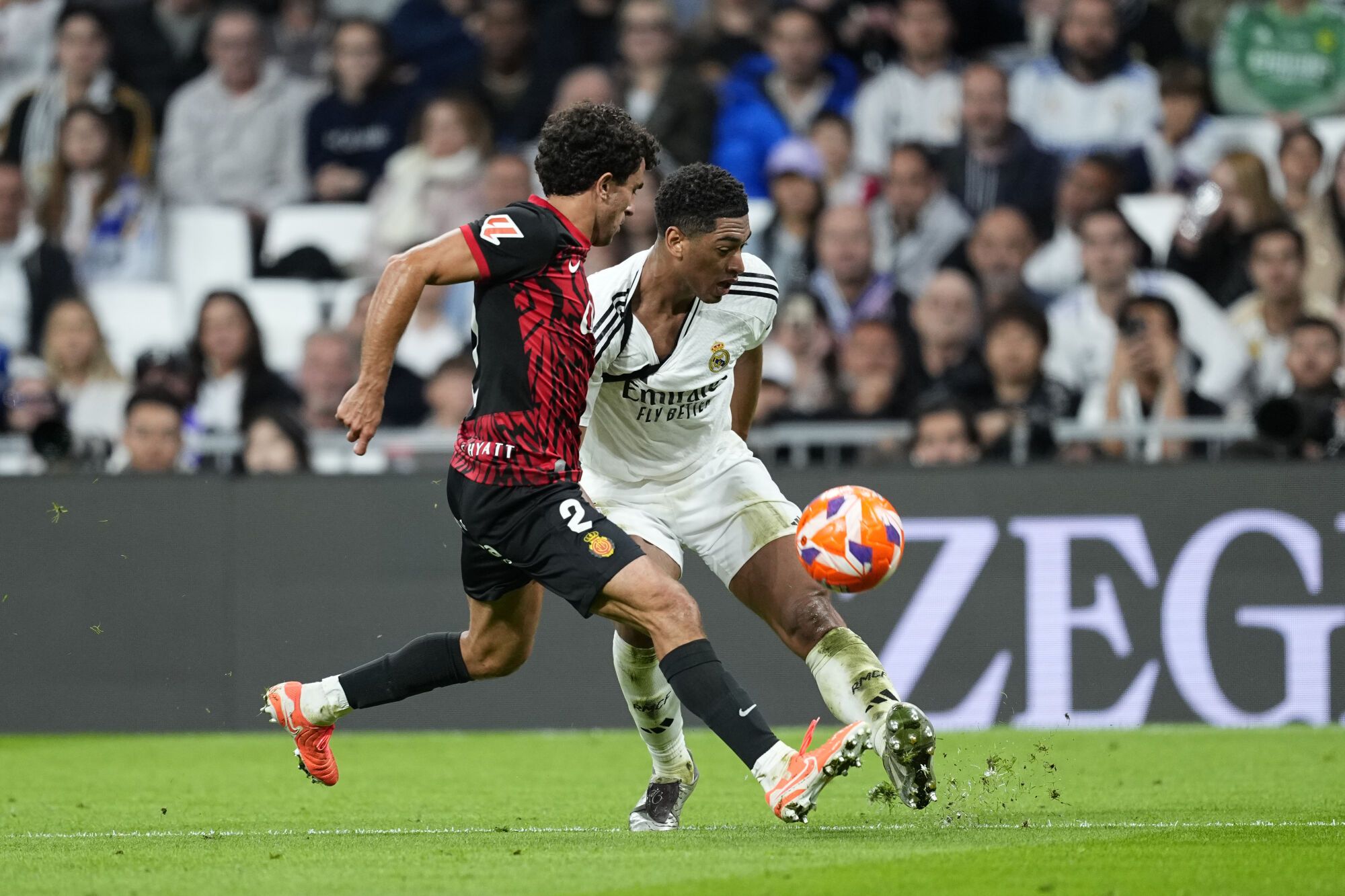 Jude Bellingham of Real Madrid and Mateu Morey of RCD Mallorca in action during the Spanish League, LaLiga EA Sports, football match played between Real Madrid and RCD Mallorca at Santiago Bernabeu stadium on May 14, 2025, in Madrid, Spain. AFP7 14/05/2025 ONLY FOR USE IN SPAIN. Oscar J. Barroso / AFP7 / Europa Press;2025;SOCCER;SPAIN;SPORT;ZSOCCER;ZSPORT;Real Madrid v RCD Mallorca - LaLiga EA Sports;