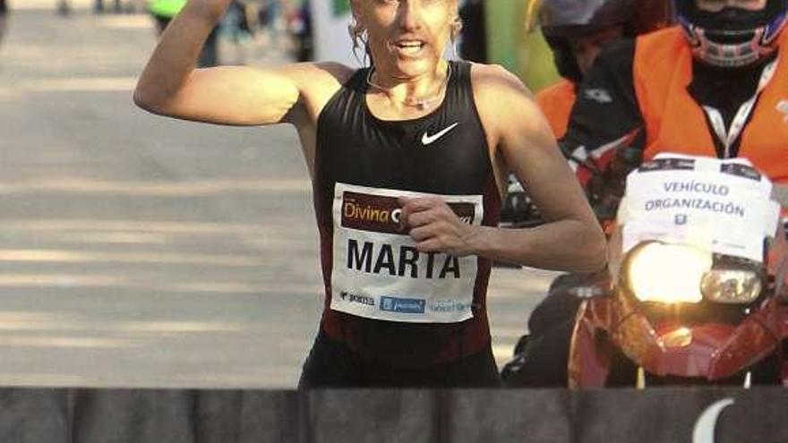 Marta Domínguez, en el momento de su entrada en meta. / kiko huesca / efe