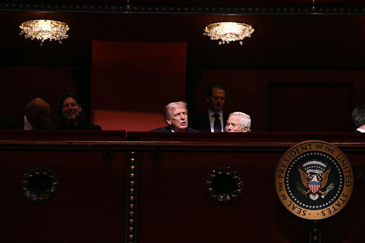 US President Donald Trump (L) chats with US businessman Robert Kraft during the world premiere of Amazon MGM Studios' "Melania" at the Kennedy Center in Washington, DC, on January 29, 2026. (Photo by Brendan SMIALOWSKI / AFP)