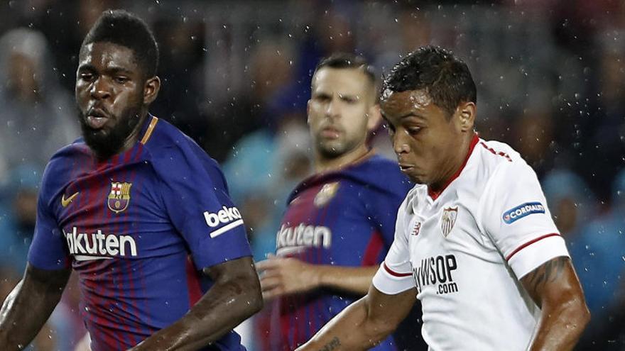 Umtiti y Muriel, en el Barcelona-Sevilla de la Liga.