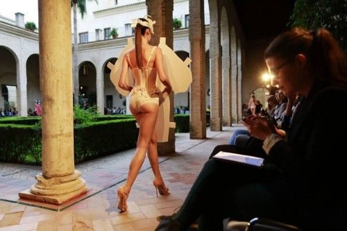 A model presents a creation by Claudina Mata during Andalucia de Moda (Andalusia Fashion) in Seville