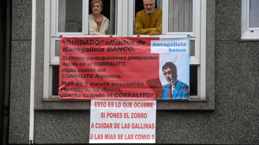 Pancarta de un afectado por participaciones preferentes en el barrio de O Ventorrillo.