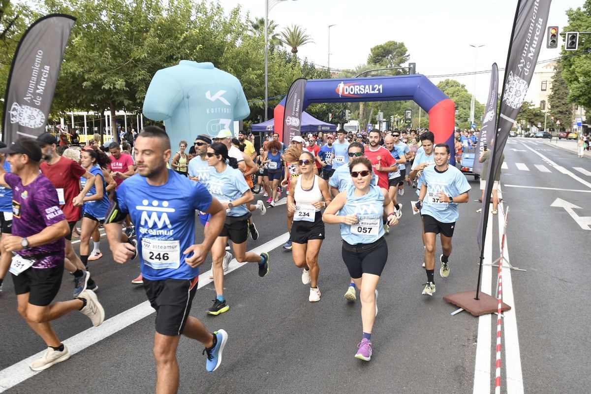 La carrera y marcha Solidaria Asteamur, en imágenes