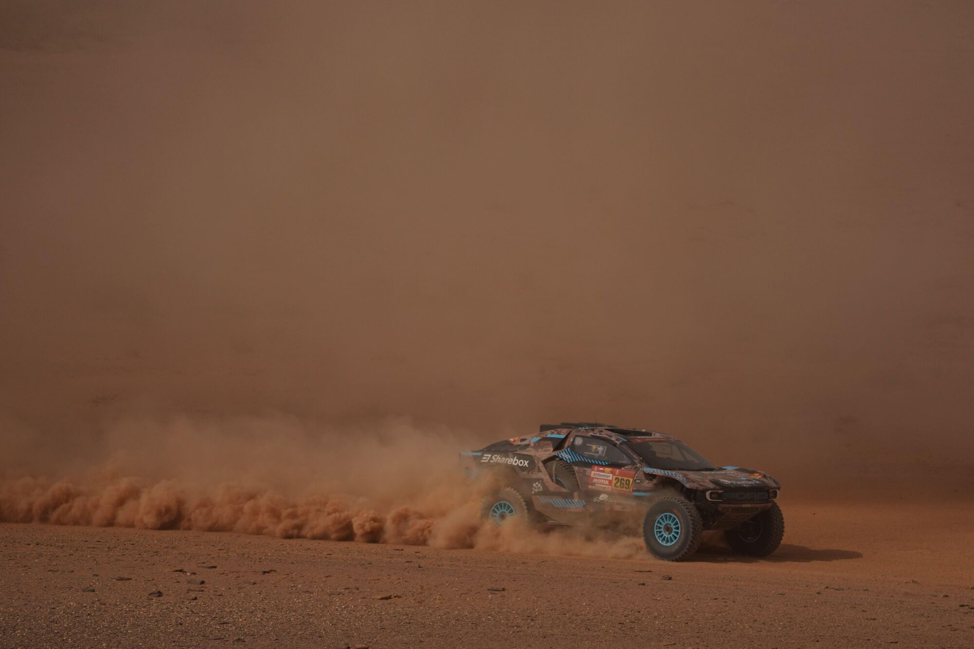 Driver Jourdan Serderidis and co-driver Gregoire Munster compete during the third stage of the Dakar Rally with a start and finish in Alula, Saudi Arabia, Tuesday, Jan. 6, 2026. (AP Photo/Thibault Camus)