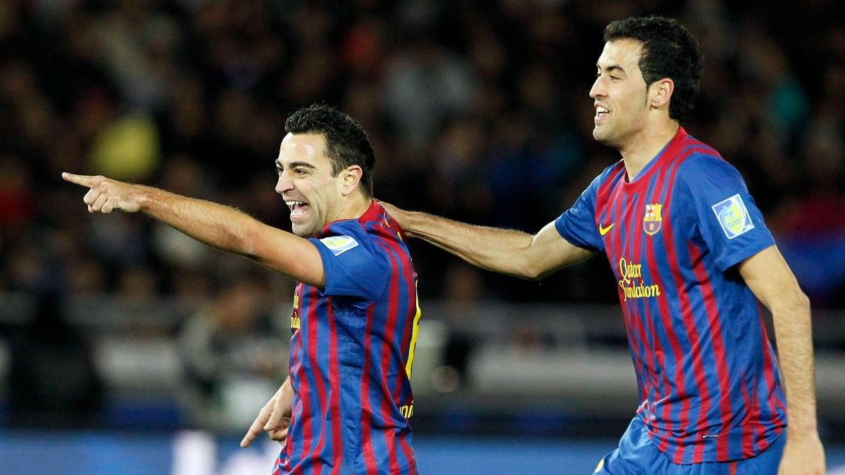 Xavi y Busquets durante el Mundial de Clubes de 2011