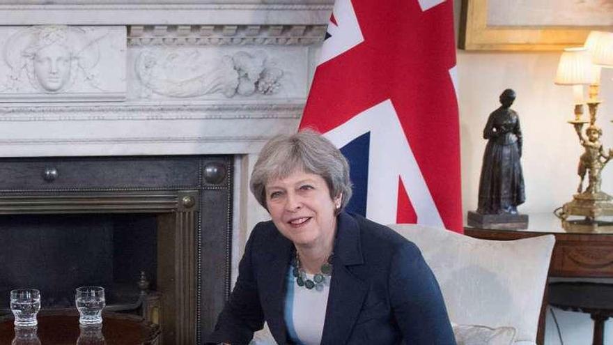 La primera ministra británica, Theresa May, ayer en Londres. // AFP