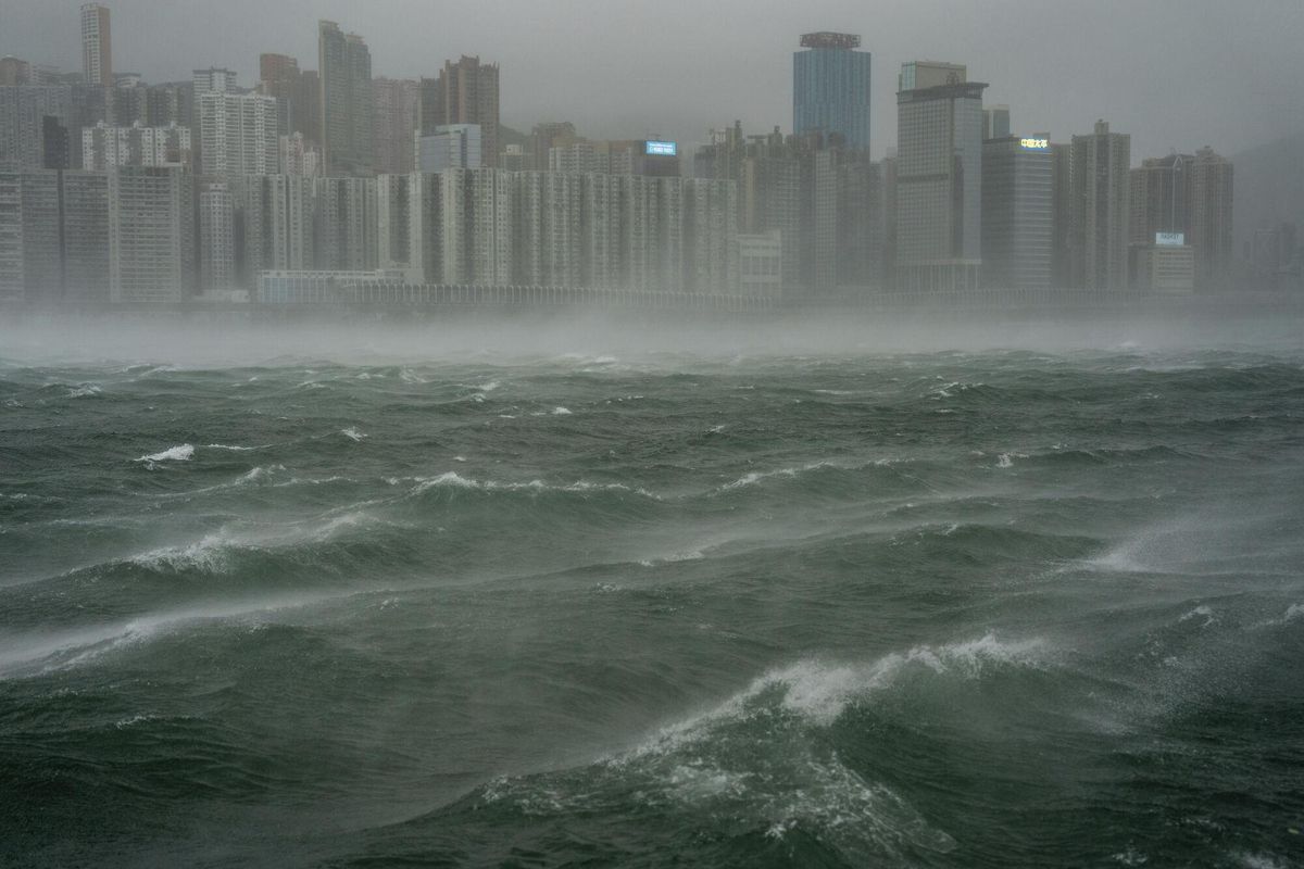 Waves are seen near the Victoria Harbor following the Typhoon Wipha, in Hong Kong, Sunday, July 20, 2025. (AP Photo/Vernon Yuen)