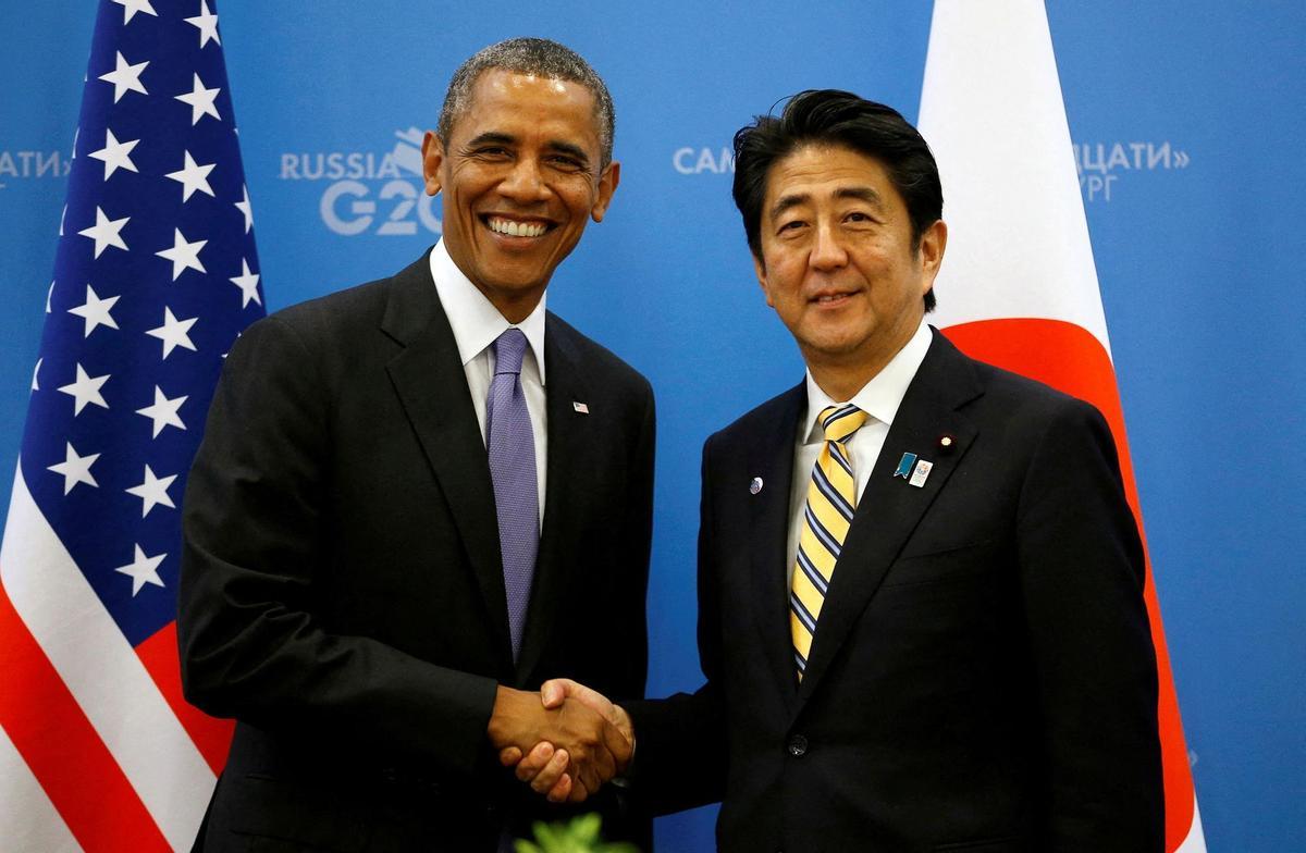 FILE PHOTO: U.S. President Obama shakes hands with Japanese PM Abe at the G20 Summit in St. Petersburg