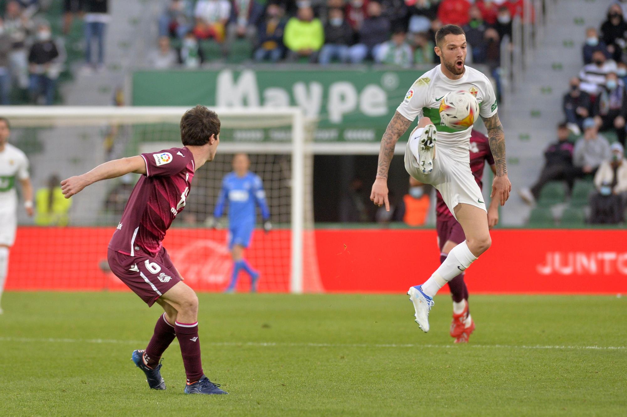 Imágenes del encuentro entre el Elche CF y la Real Sociedad.zip