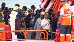 El Govern i Podem acorden regularitzar mig milió de migrants