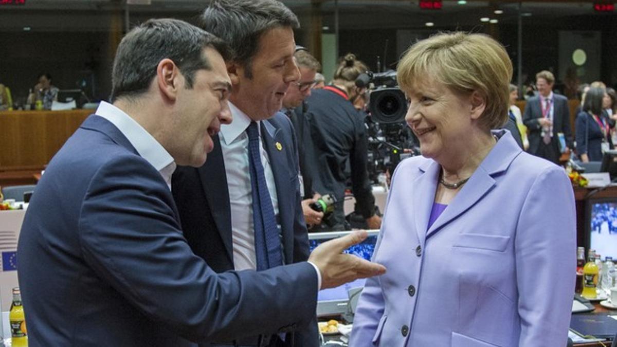Greek Prime Minister Alexis Tsipras, Italian Prime Minister Matteo Renzi and German Chancellor Angela Merkel attend a European Union leaders summit in Brussels